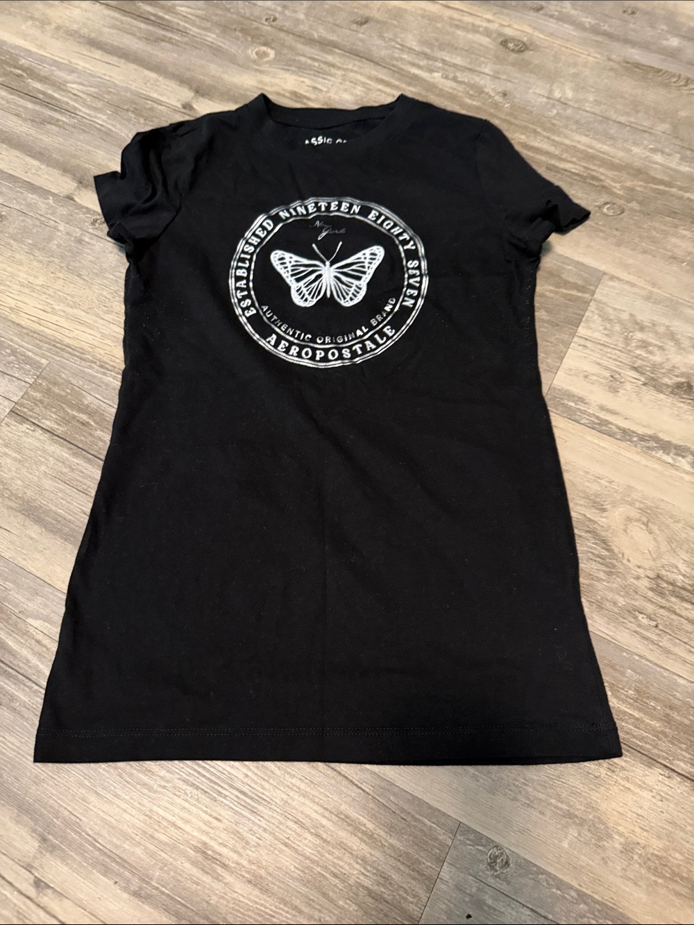 Aeropostale Black Tee with White Butterfly Emblem